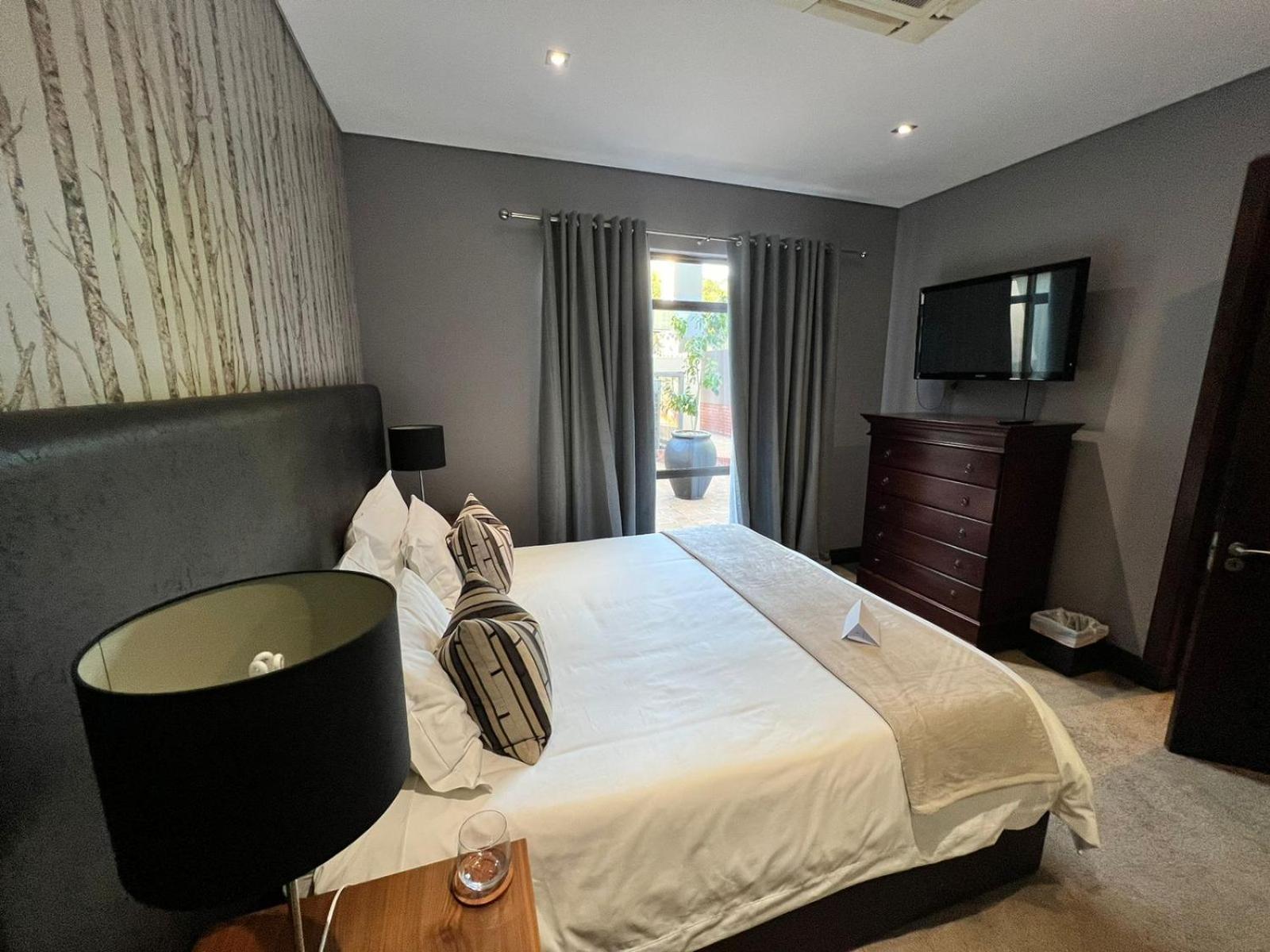 Tredenham Boutique Hotel Bloemfontein Luaran gambar A bedroom at the hotel