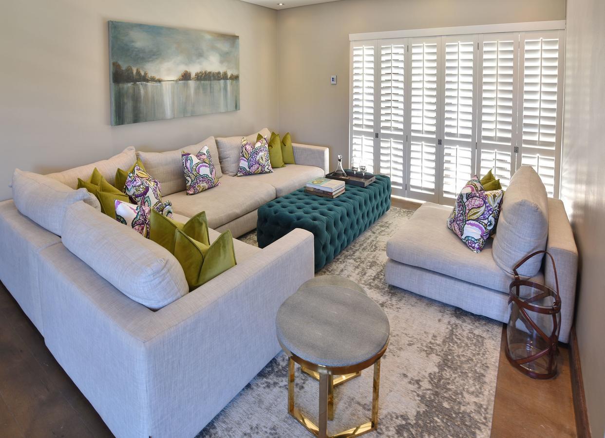 Tredenham Boutique Hotel Bloemfontein Luaran gambar A living room with plantation shutters